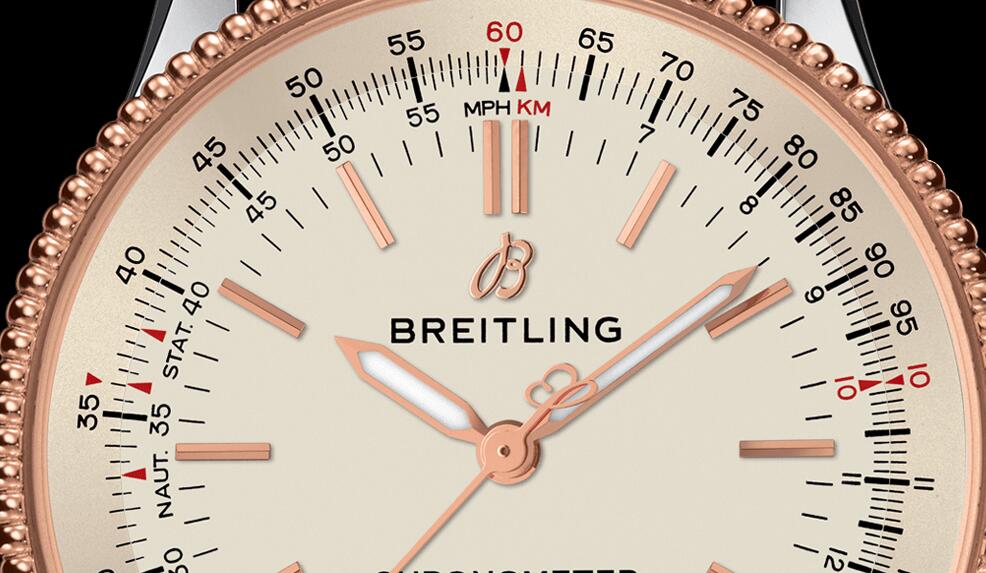 The red gold hands, hour markers and logo of Breitling are in a striking contrast to the silver dial.